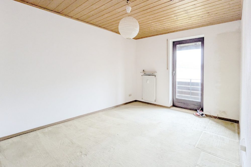 Schlafzimmer mit Balkonzugang