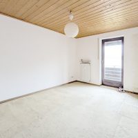 Schlafzimmer mit Balkonzugang